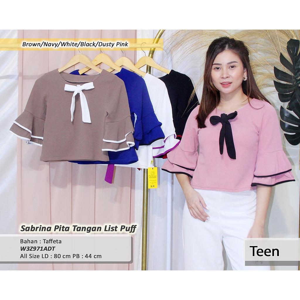 Sabrina Pita tangan list puff